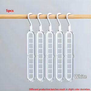 space-saving clothes hangers for bedroom closet